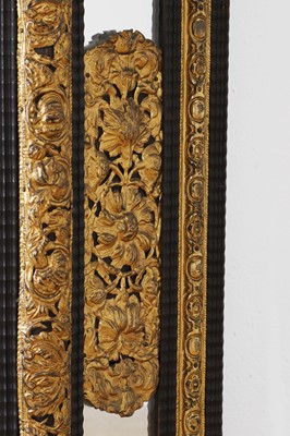 Lot 631 - A baroque gilt-metal and ebonised wooden pier mirror