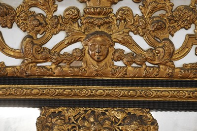 Lot 631 - A baroque gilt-metal and ebonised wooden pier mirror