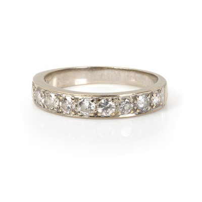 Lot 1122 - A diamond half eternity ring