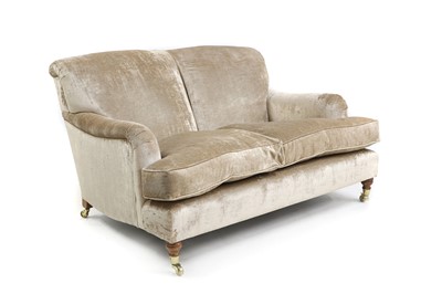 Lot 762 - A velvet-upholstered love seat in the Howard-style