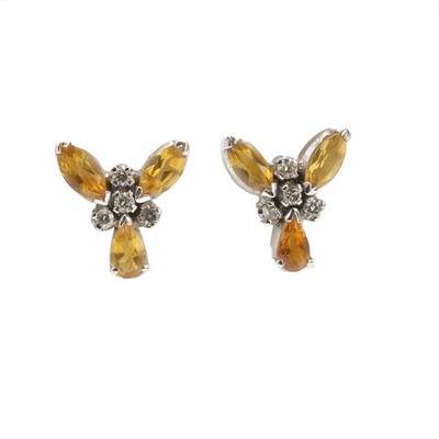 Lot 156 - A pair of white gold citrine and diamond cluster stud earrings