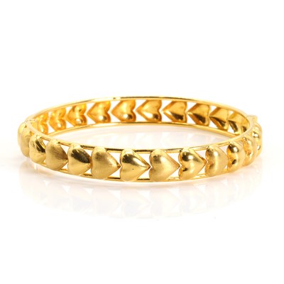 Lot 1254 - A high carat gold bangle