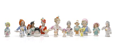 Lot 252 - A collection of porcelain half-doll figures