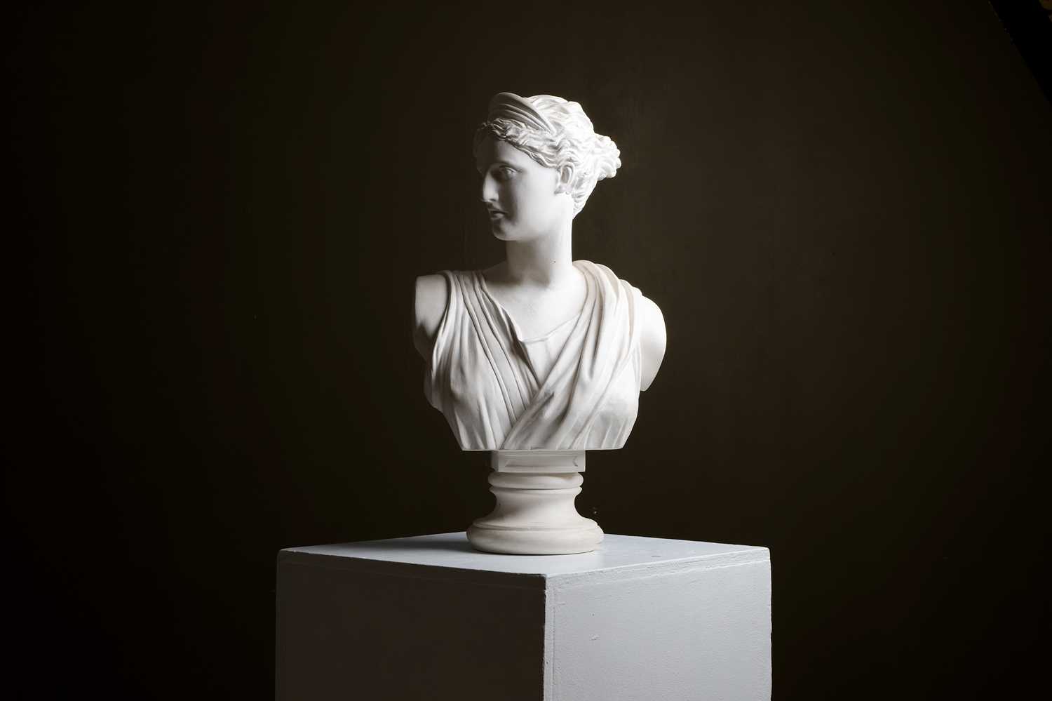Lot 640 - A painted plaster bust of the Diana of Versailles