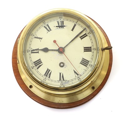 Lot 400 - A maritime brass cased bulkhead timepiece