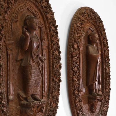 Lot 130 - A pair of hardwood panels