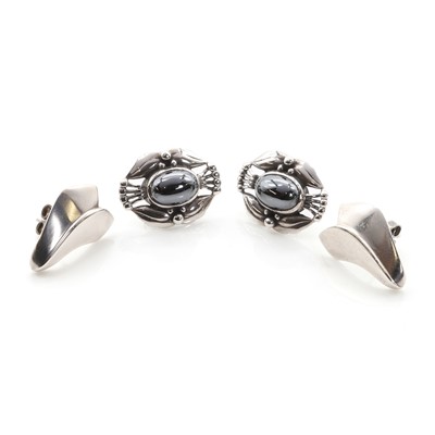 Lot 1264 - Two pairs of sterling silver stud earrings by Georg Jensen