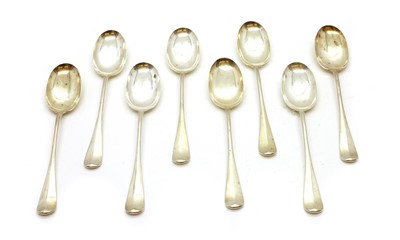 Lot 7 - A set of eight Rat Tail pattern dessert spoons