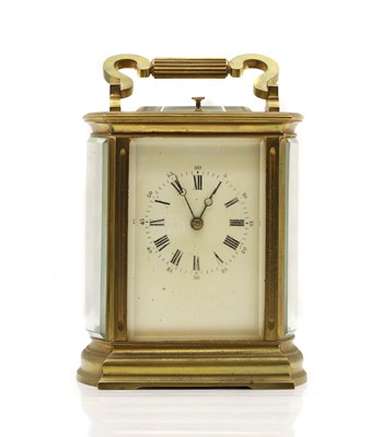 Lot 300 - A brass carriage clock