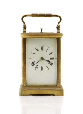 Lot 301 - A brass carriage clock