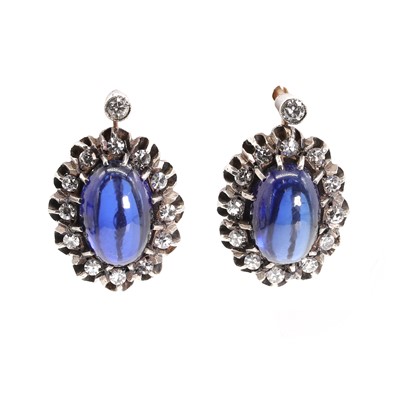 Lot 68 - A pair of silver and gold diamond and synthetic sapphire cluster earrings