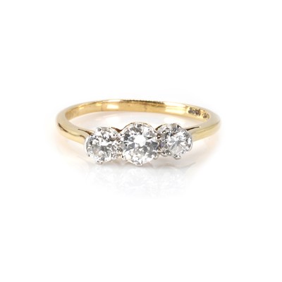 Lot 94 - A three stone diamond ring