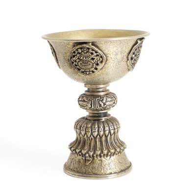 Lot 46A - A Tibetan white metal butter lamp