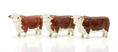 Lot 234 - Three Beswick pottery Hereford bulls