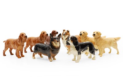 Lot 128 - A collection of Beswick pottery dogs