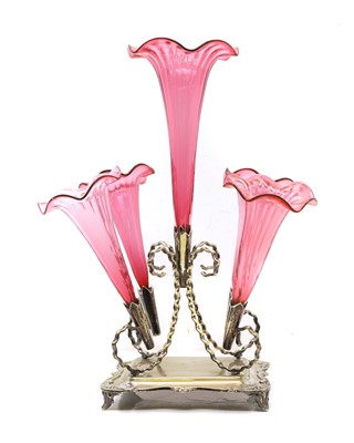 Lot 379 - A Victorian cranberry glass and silver plated epergne