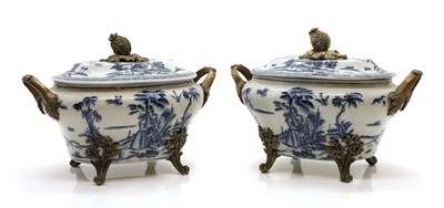 Lot 345 - A pair of Nankin style porcelain tureens and covers