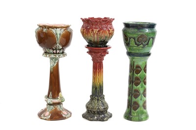 Lot 356 - Three pottery jardinières and stands