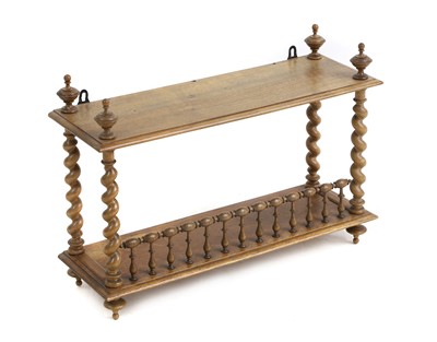 Lot 422 - A two-tier hanging wall shelf