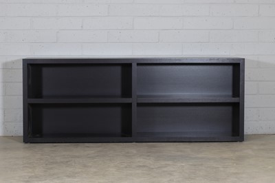 Lot 438 - An ebonised floor unit