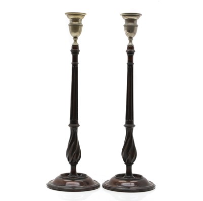 Lot 153 - A pair of turned mahogany table candlesticks