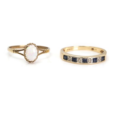 Lot 1291 - A 9ct gold opal ring and a 9ct gold sapphire and diamond half eternity ring