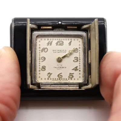 Lot 1452 - A sterling silver cased Dunhill La Captive purse watch