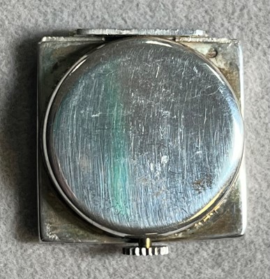 Lot 1452 - A sterling silver cased Dunhill La Captive purse watch