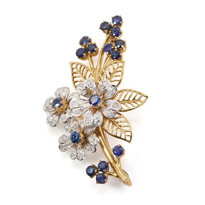 Lot 1077 - A sapphire and diamond spray brooch