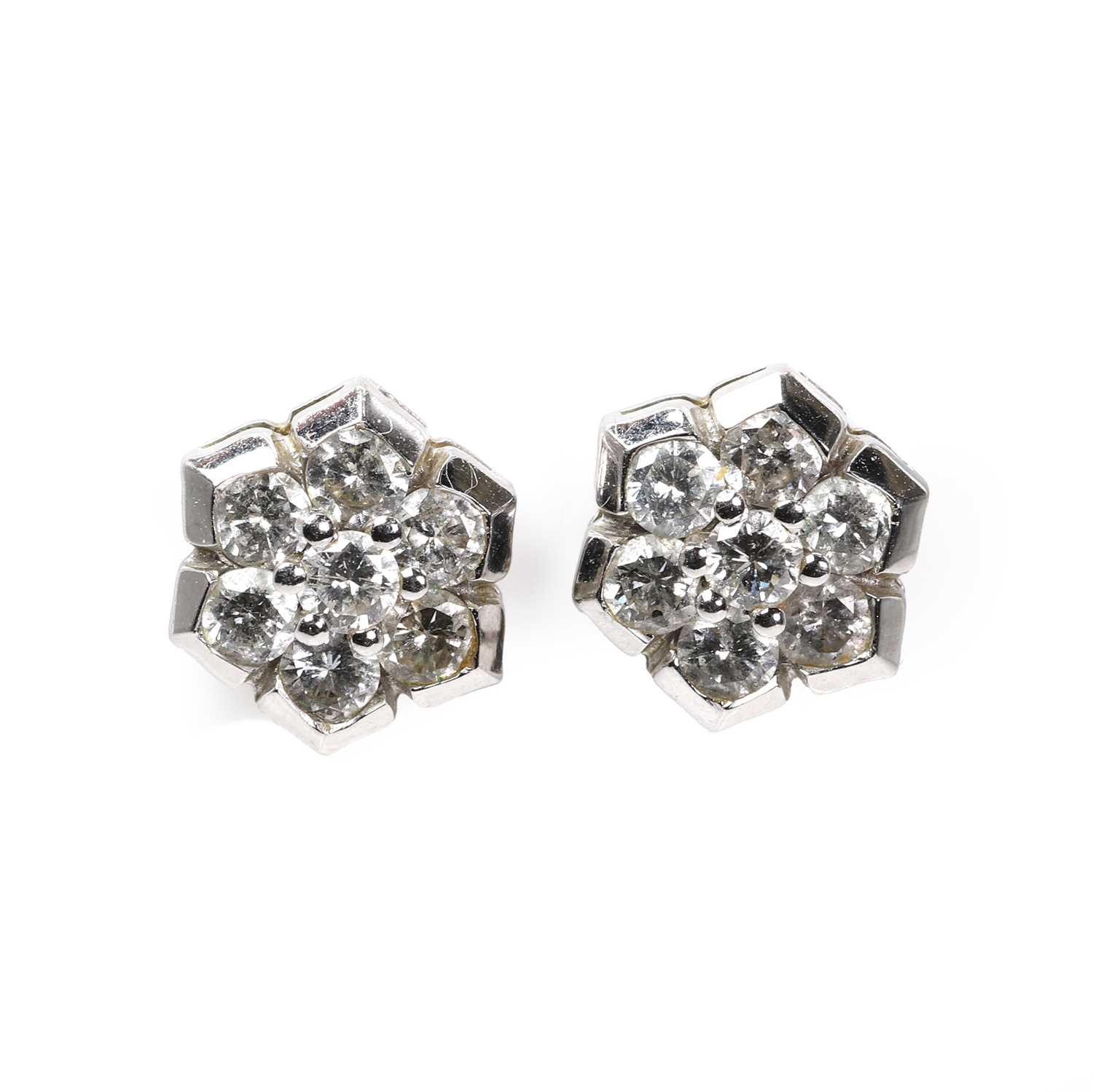 Lot 1099 - A pair of diamond cluster stud earrings