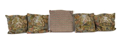 Lot 613 - A group of four needlework cushions