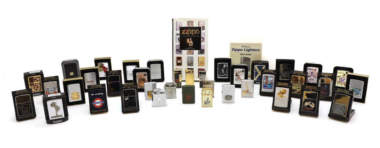 Lot 370 - A large collection of Zippo lighters