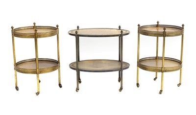 Lot 738 - A pair of regency style two tier side tables