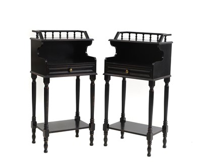 Lot 745 - A pair of ebonised bedside tables