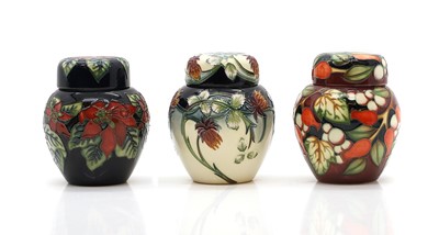 Lot 203 - Three Moorcroft pottery ginger jars and covers