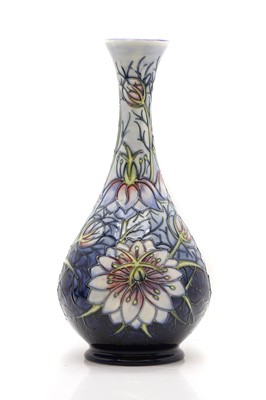 Lot 220 - A limited edition Moorcroft pottery 'Love in a Mist' pattern vase