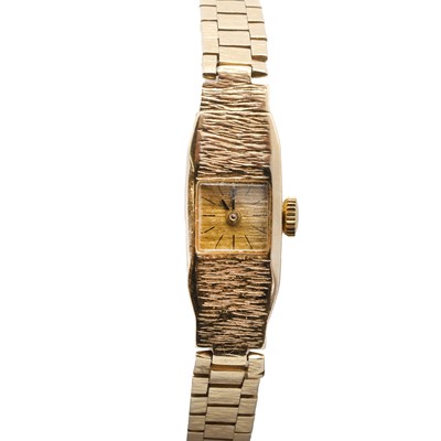 Lot 1501 - A ladies' 9ct gold mechanical bracelet watch