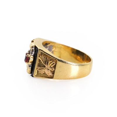 Lot 1176 - An onyx and ruby set scorpion ring