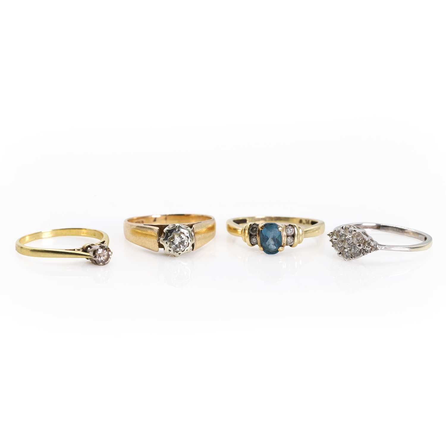 Lot 1375 - A group of four 9ct gold rings