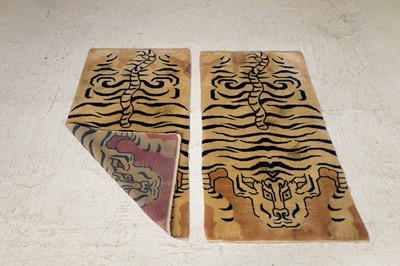 Lot 33 - A pair of wool 'tiger' rugs