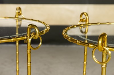 Lot 64 - A pair of gilt-bronze étagères