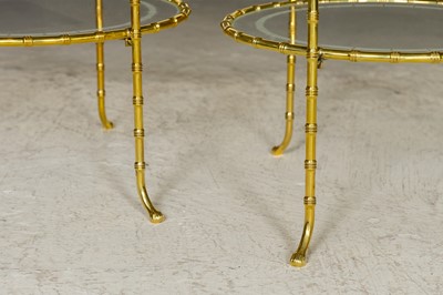 Lot 64 - A pair of gilt-bronze étagères