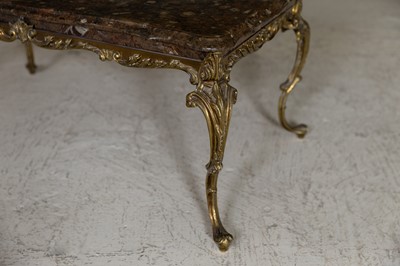 Lot 20 - A fossilised ammonite marble and gilt-brass coffee table