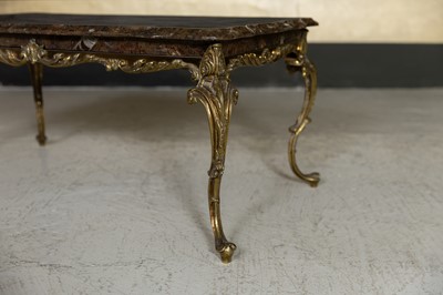 Lot 20 - A fossilised ammonite marble and gilt-brass coffee table