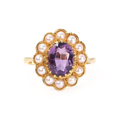 Lot 1208 - A 9ct gold amethyst and pearl cluster ring