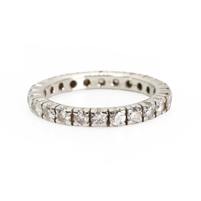 Lot 1124 - An 18ct white gold diamond full eternity ring