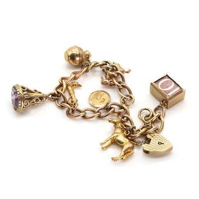 Lot 1405 - A 9ct gold charm bracelet