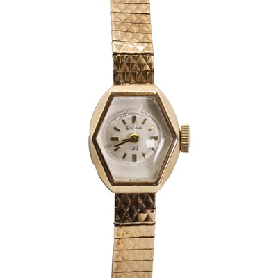 Lot 1495 - A ladies' 9ct gold Bulova mechanical bracelet watch