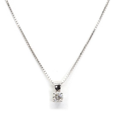 Lot 1103 - A white gold diamond pendant and chain