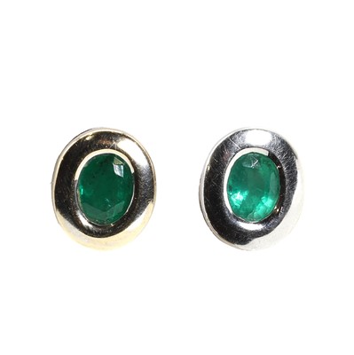 Lot 1184 - A pair of 18ct gold emerald stud earrings